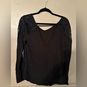 Black American Eagle stretchy top with lace.